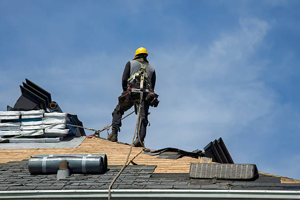 Professional Roof Replacement technician working in Durhamville, NY